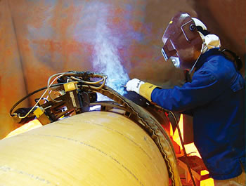 Figure 10: Welding of pipe by PREMIARCTM DW-N625P and Magnatech machine.Photograph supplied, courtesy of Magnatech International B.V.