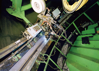 Figure 5: An automatic one-sided GMAW process
setup on the butt joint of two unit pipes inside the inclined tunnel (Courtesy of Mitsubishi Heavy Industries, Ltd., Japan).