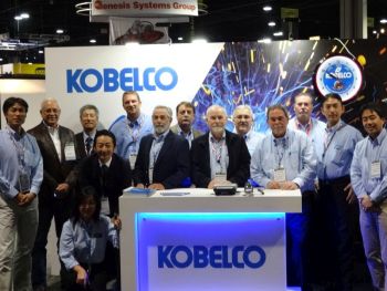 Attendees posing in front of the Kobe Steel booth (Mr Yanagimoto, first from the Right)